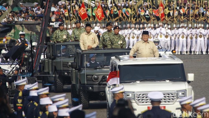 Suasana khidmat menyelimuti kawasan Silang Monas, Jakarta, Minggu (5/10/2025), saat Presiden Prabowo Subianto memimpin upacara peringatan Hari Ulang Tahun ke-80 Tentara Nasional Indonesia (TNI).
