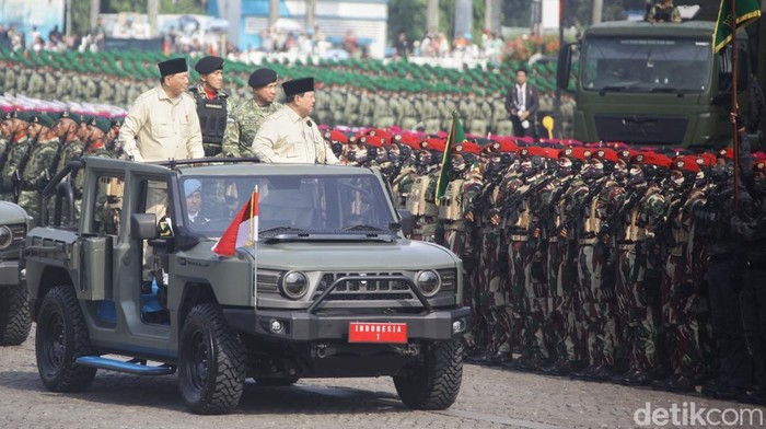 Suasana khidmat menyelimuti kawasan Silang Monas, Jakarta, Minggu (5/10/2025), saat Presiden Prabowo Subianto memimpin upacara peringatan Hari Ulang Tahun ke-80 Tentara Nasional Indonesia (TNI).