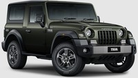 Mahindra Thar terbaru sekarang mendapat sentuhan dua warna atau dual-tone di bagian gril dan bumper depan. Sementara bagian interiornya kini dibuat lebih gelap dengan dasbor dan setir yang dilaburi kelir serba hitam. Foto: Doc. Mahindra Auto