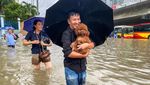 Topan Matmo Hantam Hanoi, Bikin Banjir dan Ganggu Aktivitas Warga