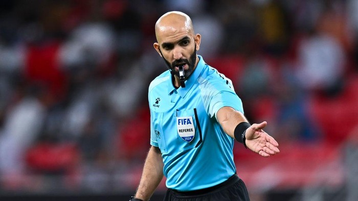 Kuwaiti referee Ahmad Alali gestures during the AFC Champions League elite football match between Qatars Al Rayyan SC and Saudi Arabias Al-Ahli SFC at Ahmad Bin Ali Stadium in Al Rayyan, Qatar, on October 21, 2024. (Photo by Noushad Thekkayil/NurPhoto via Getty Images)