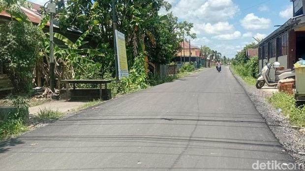 Jalan Menteng XIX Palangka Raya, Kalimantan Tengah, sudah mulus setelah diperbaiki.