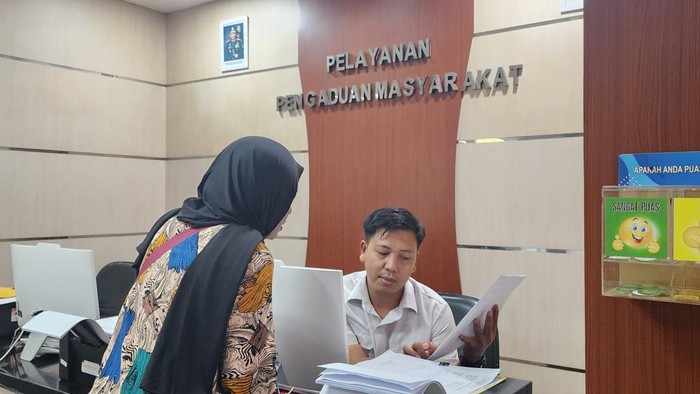 IRT saat melaporkan penganiayaan yang dialami di Polda Sumsel.