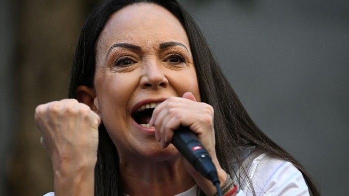(FILES) Venezuelan opposition leader Maria Corina Machado gives a speech during a protest called by the opposition on the eve of the presidential inauguration, in Caracas on January 9, 2025. Venezuela opposition leader Maria Corina Machado wins the 2025 Nobel Peace Prize, the Norwegian Nobel Committee announced on October 10, 2025. (Photo by Federico PARRA / AFP)