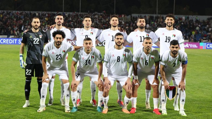 The Palestinian national team poses for a photo before the 2026 FIFA World Cup qualifying match between Palestine and Iraq at the Amman International Stadium in Amman, Jordan, on March 25, 2025. (Photo by Ameen Ahmed/NurPhoto via Getty Images)
