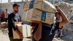 Warga Gaza Berebut Pasokan Bantuan di Tengah Gencatan Senjata