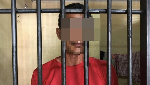 FK (41), oknum ASN Pemkot Bima yang membunuh istrinya ditahan di Mapolres Bima Kota, Senin, (13/10/2025). (Dok. Humas Polres Bima Kota).