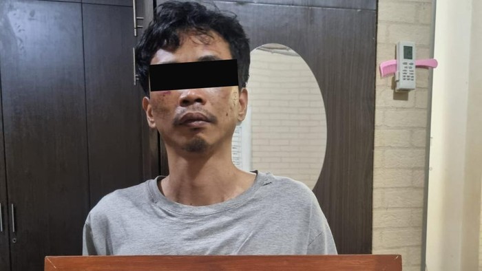 Tampang tersangka penipuan, AR (31), yang mengaku sebagai salah satu staf anggota Komisi III DPR.
