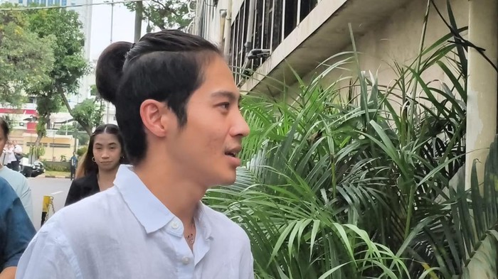 Giovanni Surya atau DJ Panda saat tiba di Polda Metro Jaya