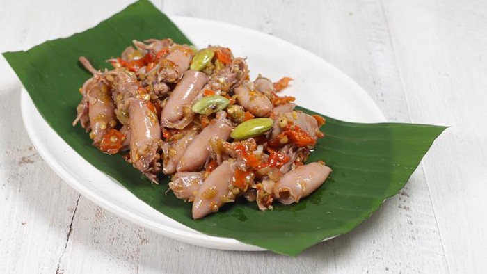 Sambal cumi asin or Spicy stir fried salted squid with pete.