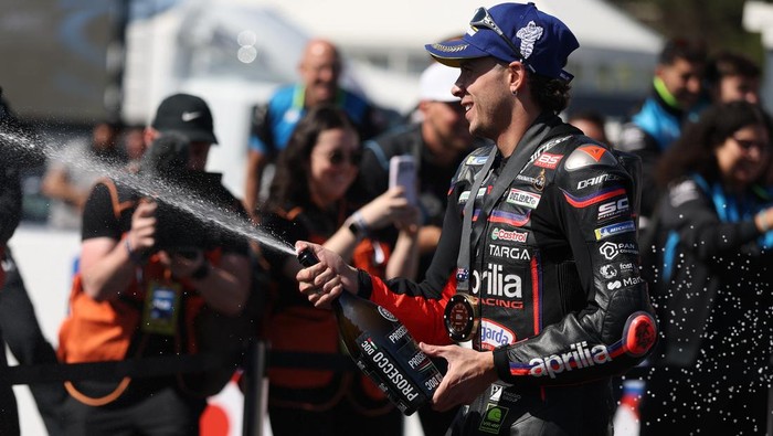 PHILLIP ISLAND, AUSTRALIA - OCTOBER 18: Marco Bezzecchi of Italy and rider of the #72 Aprilia Racing celebrates after winning the Moto GP Sprint Race for the MotoGP of Australia at Phillip Island Grand Prix Circuit on October 18, 2025 in Phillip Island, Australia. (Photo by Robert Cianflone/Getty Images)