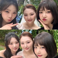 Adik Joy Red Velvet, Park Ji Young terlihat menawan dalam balutan gaun putih di hari bahagianya. Si anak tengah diapit oleh dua saudaranya yang tak kalah elegan, mengenakan gaun hitam. Foto: dok. Instagram @_imyour_joy