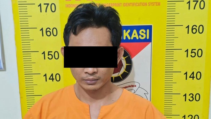 Tersangka AH (35) ditangkap polisi Tersangka AH (35) ditangkap polisi