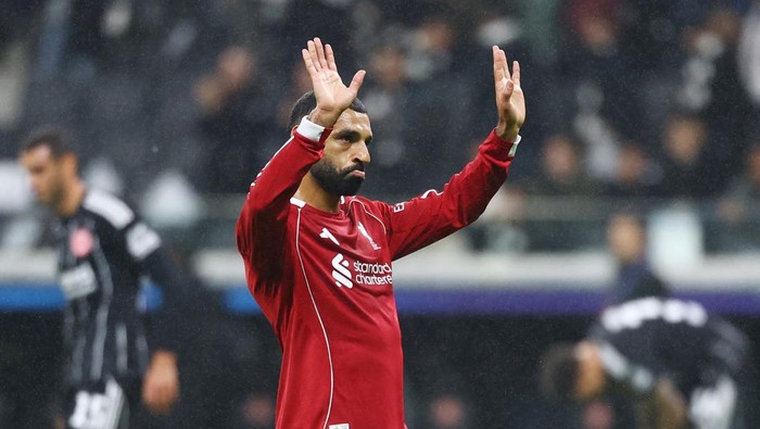 Soccer Football - UEFA Champions League - Eintracht Frankfurt v Liverpool - Deutsche Bank Park, Frankfurt, Germany - October 22, 2025  Liverpools Mohamed Salah celebrates after the match REUTERS/Kai Pfaffenbach