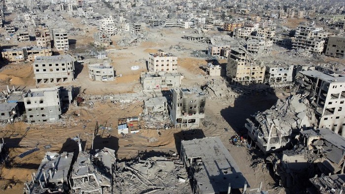 Potret dari Udara Tunjukkan Kota yang Hancur di Gaza A drone view shows the destruction in a residential neighborhood, after the withdrawal of the Israeli forces from the area, amid a ceasefire between Israel and Hamas in Gaza, in Gaza City, October 21, 2025. REUTERS/Dawoud Abu Alkas