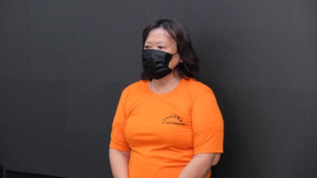 Polda Riau menangkap Gloria Riahta Sinulingga alias Gordon (55) perambah lahan tanpa izin di kawasan hutan di Kabupaten Bengkalis. (dok Istimewa)