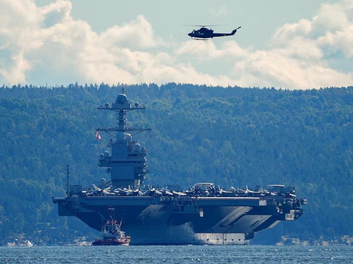 The worlds largest warship, U.S. aircraft carrier USS Gerald R. Ford is seen in this file photo, on its way out of the Oslofjord at Nesodden and Bygdoy, Norway, September 17, 2025. NTB/Lise Aserud via REUTERS/File Photo Purchase Licensing Rights