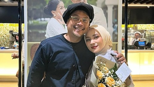 Enno Lerian dan Suami