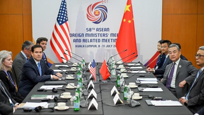 MALAYSIA-ASEAN-DIPLOMACY US Secretary of State Marco Rubio (2nd L) meets with Chinas Foreign Minister Wang Yi (2nd R) during the 58th ASEAN Foreign Ministers meeting and related meetings at the Convention Centre in Kuala Lumpur on July 11, 2025. (Photo by Mandel NGAN / POOL / AFP)