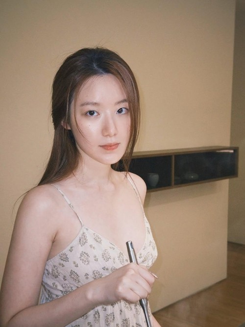 Member girlband K-Pop i-dle, Shuhua.