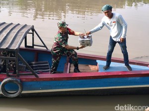 Distribusi MBG di Daerah Terpencil Sidoarjo Pakai Perahu