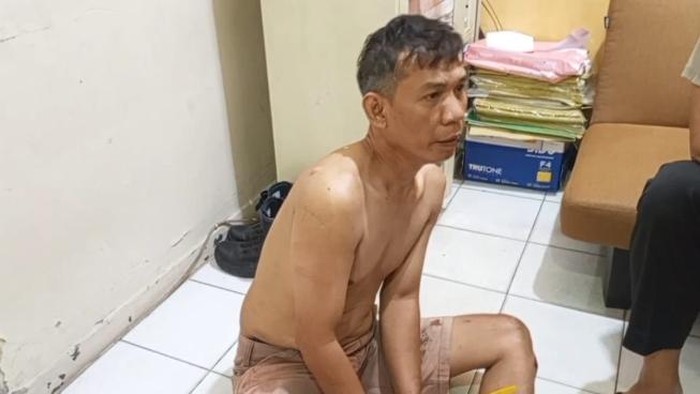 Jambret Diamankan Warga Komarudin pelaku jambret di Palembang saat diamankan di Polsek SU II.