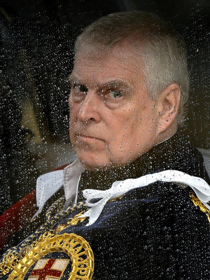 FILE PHOTO: Britains Prince Andrew speaks with King Charles as they leave Westminster Cathedral at the end of the Requiem Mass, on the day of the funeral of Britains Katharine, Duchess of Kent, in London, Britain, September 16, 2025. REUTERS/Toby Melville/File Photo