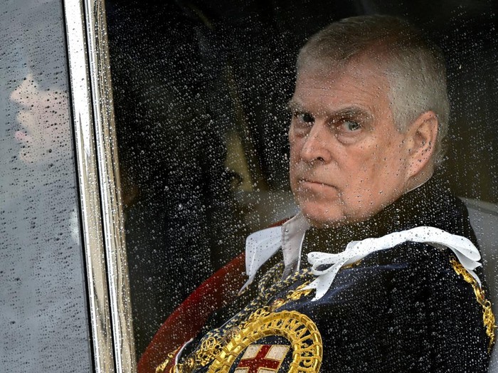 FILE PHOTO: Britains Prince Andrew speaks with King Charles as they leave Westminster Cathedral at the end of the Requiem Mass, on the day of the funeral of Britains Katharine, Duchess of Kent, in London, Britain, September 16, 2025. REUTERS/Toby Melville/File Photo