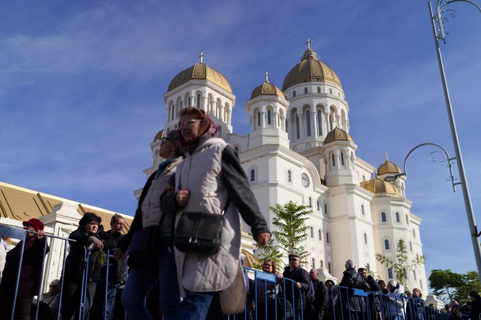 People wait in line to visit the National Cathedral, the worlds largest Orthodox church, in Bucharest, Romania, October 30, 2025. 