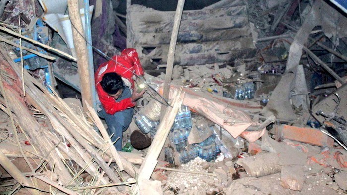 A rescuer works following an earthquake at an unidentified location in Afghanistan, in this handout image released November 3, 2025.    Afghan Red Crescent/Handout via REUTERS    THIS IMAGE HAS BEEN SUPPLIED BY A THIRD PARTY. NO RESALES. NO ARCHIVES. MANDATORY CREDIT     TPX IMAGES OF THE DAY
