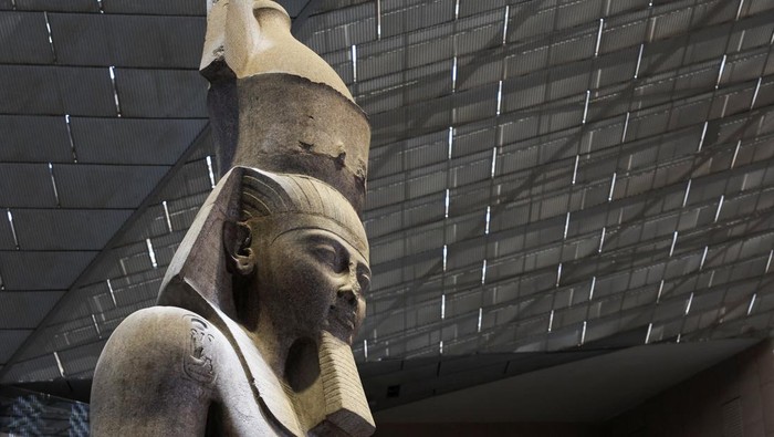 A statue of King Ramses II, one of the country's most iconic monuments, stands in the main hall of the Grand Egyptian Museum, welcoming visitors touring the site ahead of the museum's official opening on November 1, in Giza, on the southwestern outskirts of the capital Cairo, Egypt June 12, 2025. REUTERS/Amr Abdallah Dalsh