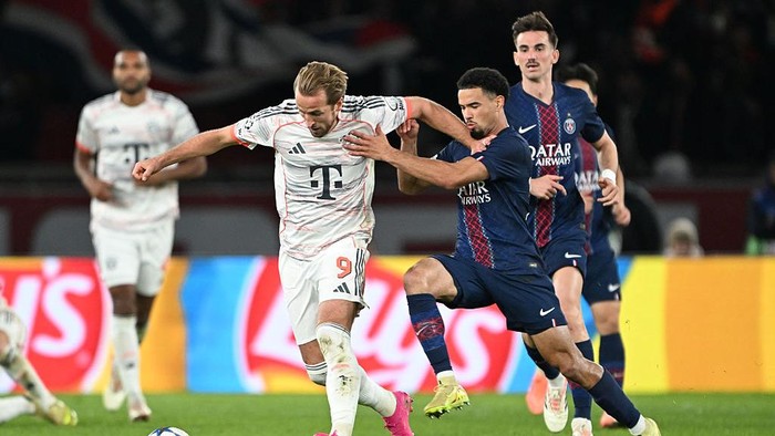 04 November 2025, France, Paris: Soccer: Champions League, Paris Saint-Germain - Bayern Munich, Preliminary Round, Matchday 4, Parc des Princes. Warren Zaïre-Emery (r, Paris Saint-Germain) against Harry Kane (Bayern Munich). Photo: Federico Gambarini/dpa (Photo by Federico Gambarini/picture alliance via Getty Images)