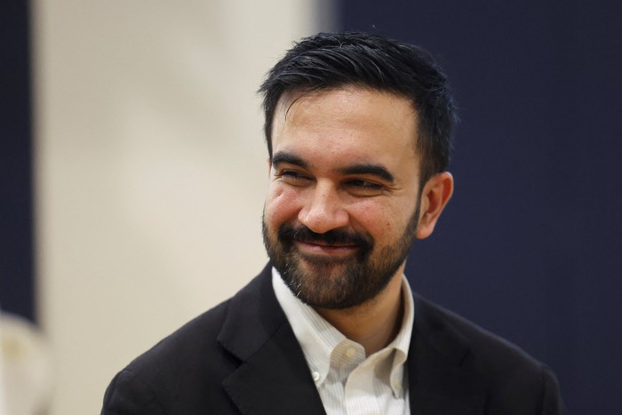 Democratic candidate for New York City mayor, Zohran Mamdani, looks on as he holds a campaign rally on the eve of election day, in the Queens borough of New York City, U.S., November 3, 2025. REUTERS/Shannon Stapleton
