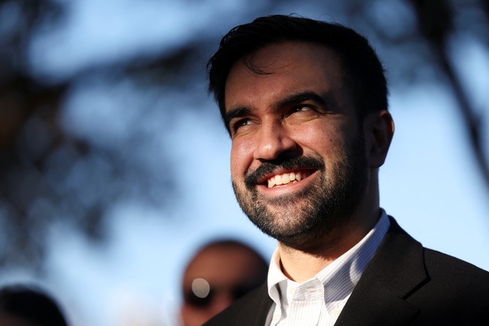Democratic candidate for New York City mayor, Zohran Mamdani, stands next to National Director of the Working Families Party Maurice Mitchell, during the New York City mayoral election, at the PS 20 The Clinton Hill School, in the Brooklyn borough of New York City, U.S., November 4, 2025. REUTERS/Kylie Cooper