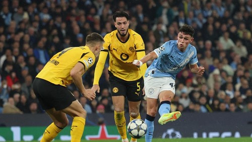 Soccer Football - UEFA Champions League - Manchester City v Borussia Dortmund - Etihad Stadium, Manchester, Britain - November 5, 2025 Manchester Citys Phil Foden scores their third goal REUTERS/Phil Noble