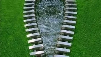 Patung Ritsleting oleh Yasuhiro Suzuki. Foto: via StreetArtUtopia