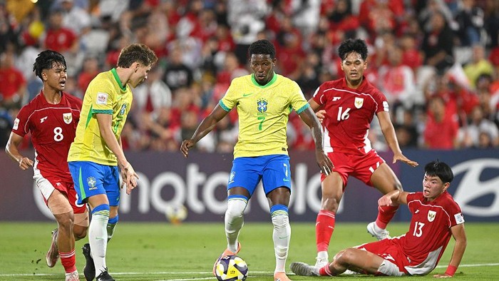DOHA, QATAR - NOVEMBER 07: Ruan Pablo of Brazil runs with the ball during the FIFA Under-17 World Cup match between Brazil and Indonesia at Aspire Academy on November 07, 2025 in Doha, Qatar. (Photo by Chris Ricco - FIFA/FIFA via Getty Images)