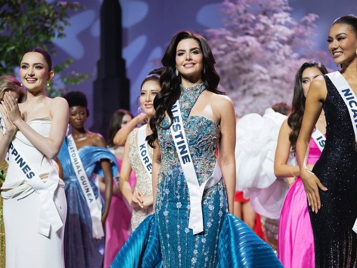 Viral momen Miss Israel, Melanie Shiraz memberikan side eye alias tatapan sinis kepada Miss Palestine, Nadeen Ayoub di ajang Miss Universe 2025.