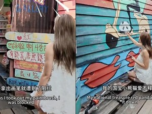 Turis Bikin Heboh, Menggambar Panda di Situs UNESCO Penang