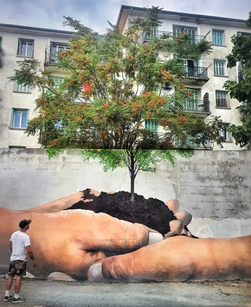 Seni jalanan bertema 'tangan'