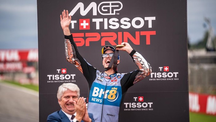 VALENCIA, SPAIN - NOVEMBER 15: Alex Marquez of Spain and Gresini Racing MotoGP™ celebrates his win on the podium during the Sprint of the MotoGP Motul Grand Prix of the Valencian Community at Ricardo Tormo Circuit on November 15, 2025 in Valencia, Spain. (Photo by Steve Wobser/Getty Images)