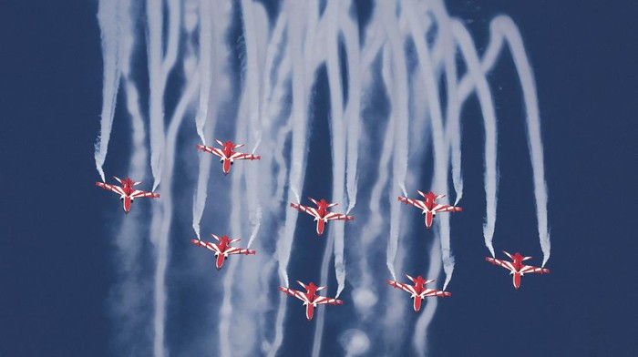 Aircrafts perform a flypast in front of attendees at the Dubai Airshow in Dubai, United Arab Emirates, November 17, 2025. REUTERS/Amr Alfiky