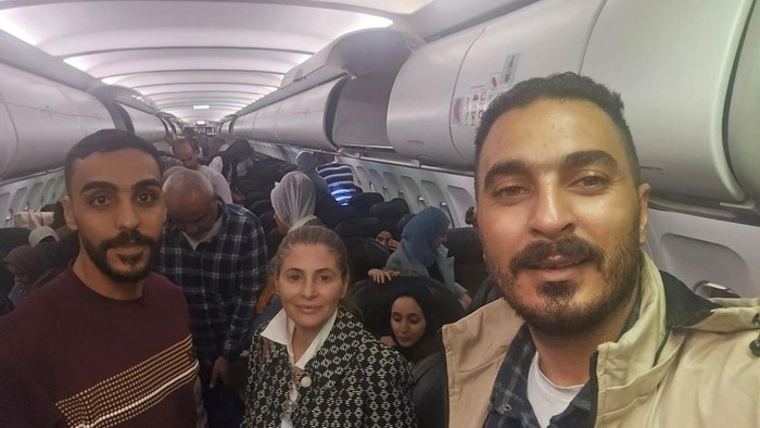 Hanan Jarrar, Palestinian ambassador to South Africa, smiles for a picture on a plane in a location given as given as Johannesburg, South Africa, in this handout image released on November 13, 2025. (Embassy of the State of Palestine/South Africa via Facebook/Handout via REUTERS)