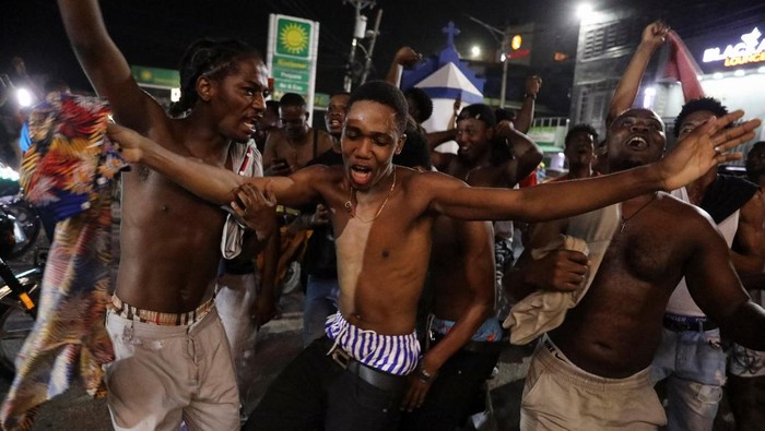 Fans react after Haitis win over Nicaragua during a qualifier for the 2026 World Cup, in Port-au-Prince, Haiti, November 18, 2025. REUTERS/Egeder Pq Fildor