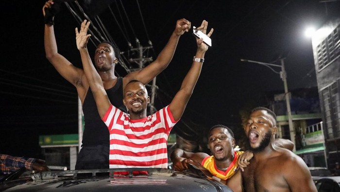 Fans react after Haitis win over Nicaragua during a qualifier for the 2026 World Cup, in Port-au-Prince, Haiti, November 18, 2025. REUTERS/Egeder Pq Fildor
