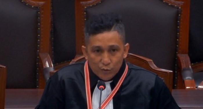 Pengacara Firdaus Oiwobo saat sidang di MK