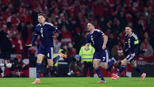 Soccer Football - FIFA World Cup - UEFA Qualifiers - Group C - Scotland v Denmark - Hampden Park, Glasgow, Scotland, Britain - November 18, 2025 Scotlands Scott McTominay celebrates scoring their first goal with John McGinn and Andrew Robertson REUTERS/Russell Cheyne
