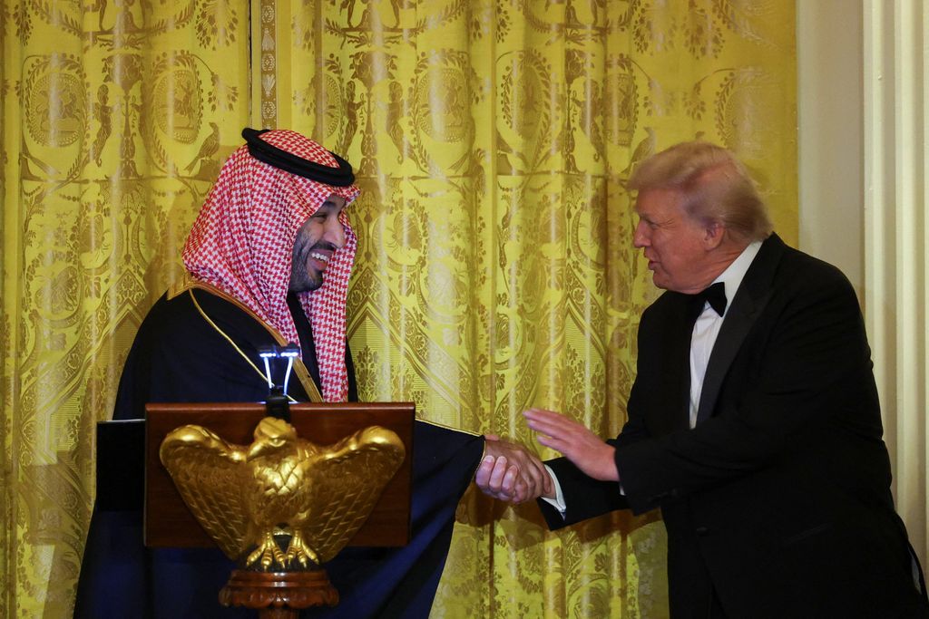 U.S. President Donald Trump greets Saudi Crown Prince and Prime Minister Mohammed bin Salman, during a dinner at the White House in Washington, D.C., U.S., November 18, 2025. REUTERS/Tom Brenner
