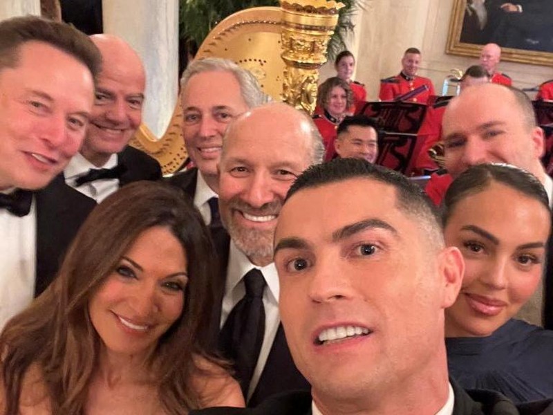 Cristiano Ronaldo takes a selfie with Georgina Rodriguez, Elon Musk, FIFA President Gianni Infantino and U.S. Secretary of Commerce Howard Lutnick as they attend a dinner hosted by U.S. President Donald Trump for Saudi Crown Prince and Prime Minister Mohammed bin Salman, at the White House in Washington, D.C., U.S., November 18, 2025, in this picture obtained from social media. DavidSacks via X/via REUTERS  THIS IMAGE HAS BEEN SUPPLIED BY A THIRD PARTY. MANDATORY CREDIT. NO RESALES. NO ARCHIVES.
