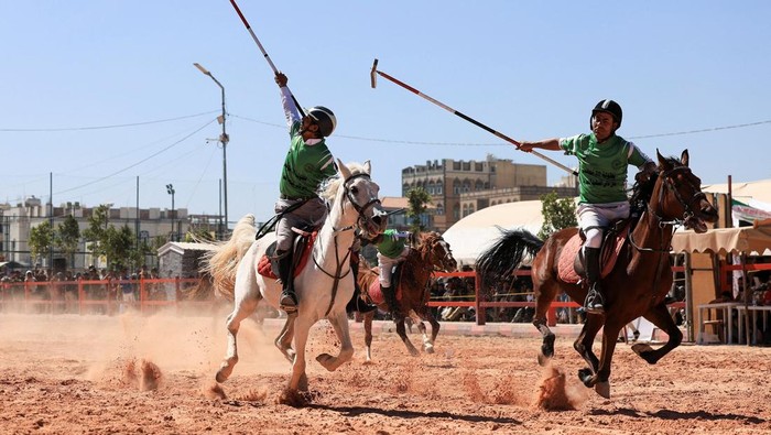 Riders participate in a tent pegging competition, as a funding crisis threatens Yemeni horse riders' dreams before regional World Cup qualifying competitions, in Sanaa, Yemen November 15, 2025. REUTERS/Khaled Abdullah